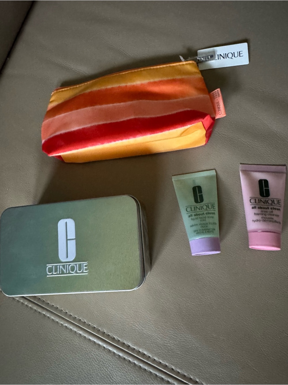 Clinique Striped Cosmetic Pouch in Yellow, Orange and Red